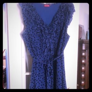 Blue with black polka dots and frilly sleeves